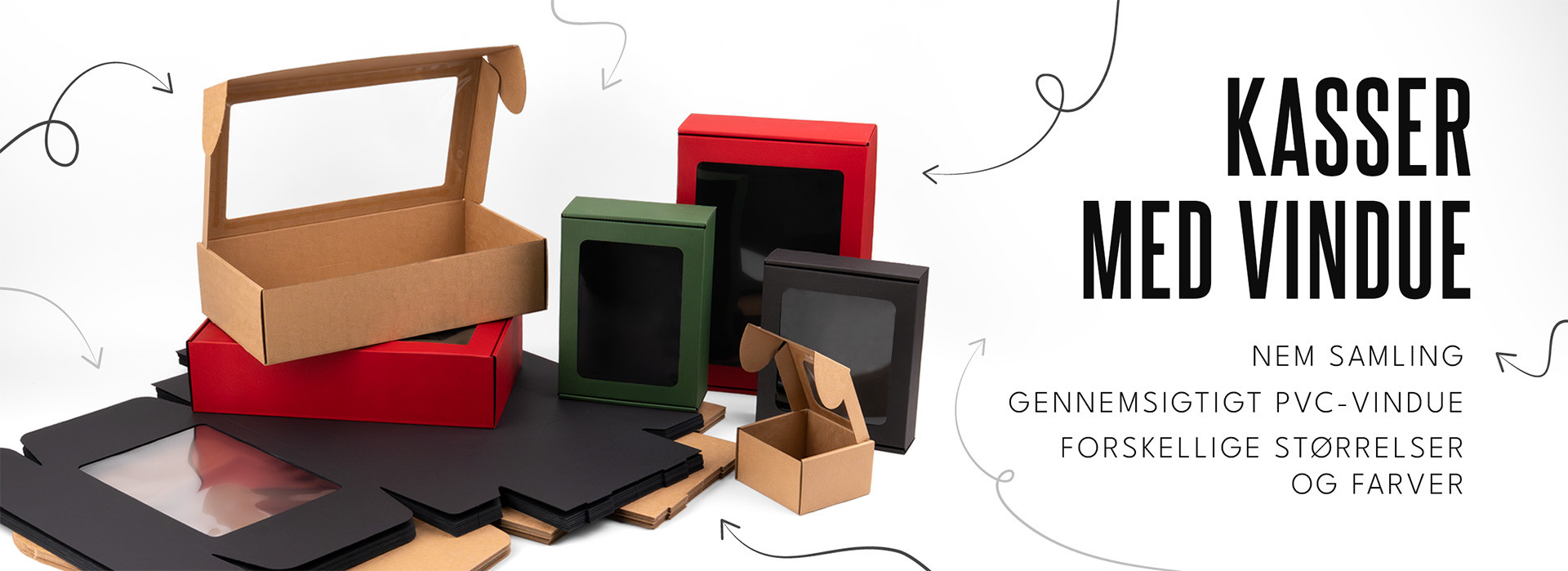 Papkasser i forskellige størrelser og farver med gennemsigtige PVC-vinduer på hvid baggrund